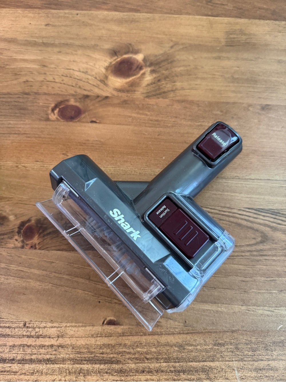 Shark Mini Motorized Brush accessory in charcoal gray